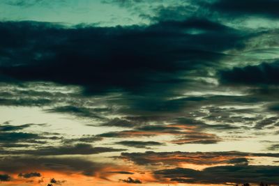 Low angle view of dramatic sky during sunset