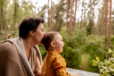 Happy grandmother and grandson enjoy time together. positive middle age woman 