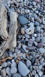 High angle view of stones on pebbles