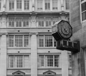 Low angle view of clock on building