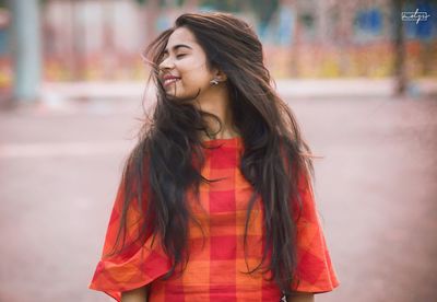 Portrait of a smiling young woman