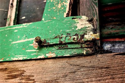 Close-up of an abandoned rusty door