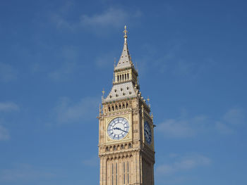 Low angle view of big ben against sky