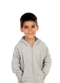 Portrait of smiling boy standing against white background