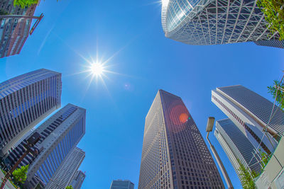 Low angle view of modern buildings against clear sky