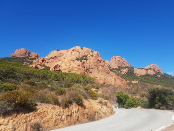 Scenic view of mountain against clear blue sky