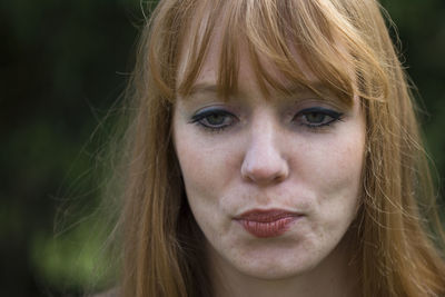 Close-up of beautiful woman with blond hair