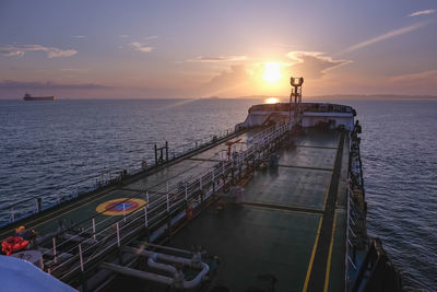 High angle view of sea against sky during sunset