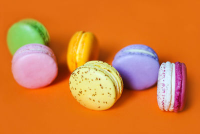 Close-up of multi colored candies on table