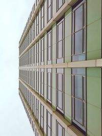 Low angle view of modern building against clear sky