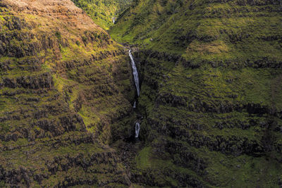 Napali coast mountains with waterfall