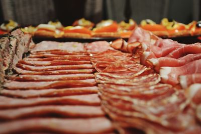 Close-up of salami arranged in charcuterie