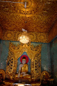 Low angle view of buddha statue in temple