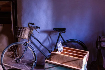 Bicycle against wall at home