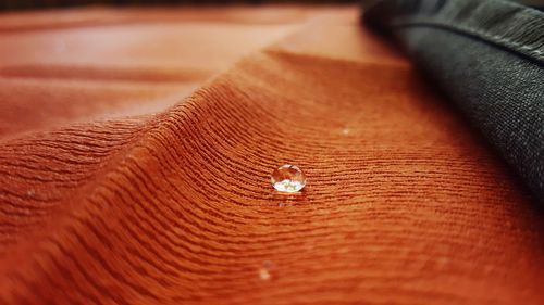 Close-up of drops on table