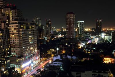 Illuminated cityscape at night