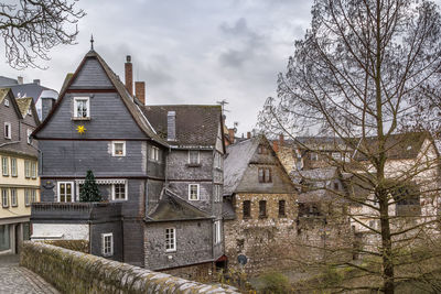 Historical houses on the lahn river bank in wetzlar, germany