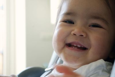 Close-up portrait of smiling boy