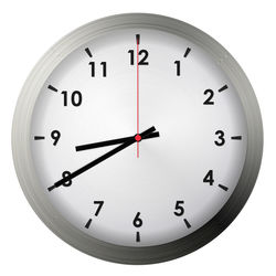 Close-up of clock over white background