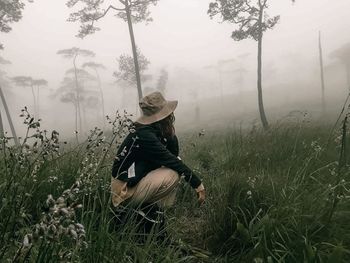 Woman on grass in field
