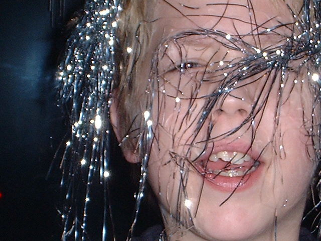 YOUNG WOMAN IN WET GLASS