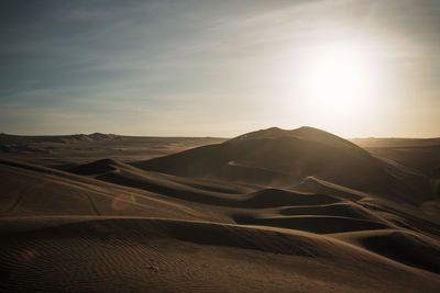 Scenic view of desert against sky