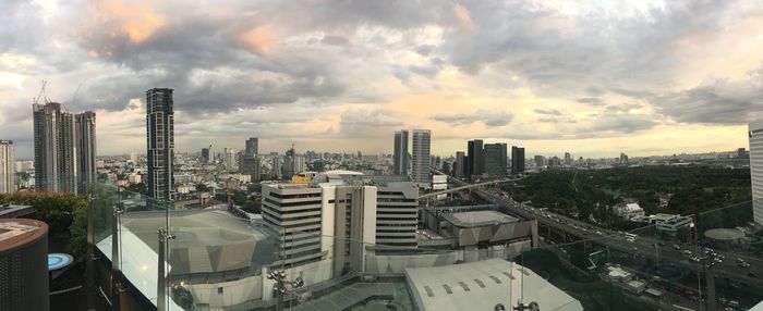 High angle view of buildings in city against sky