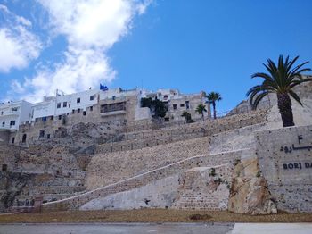 Panoramic view of old building against blue sky