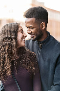 Young couple kissing outdoors