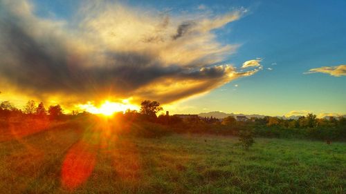 Scenic view of sunset over landscape