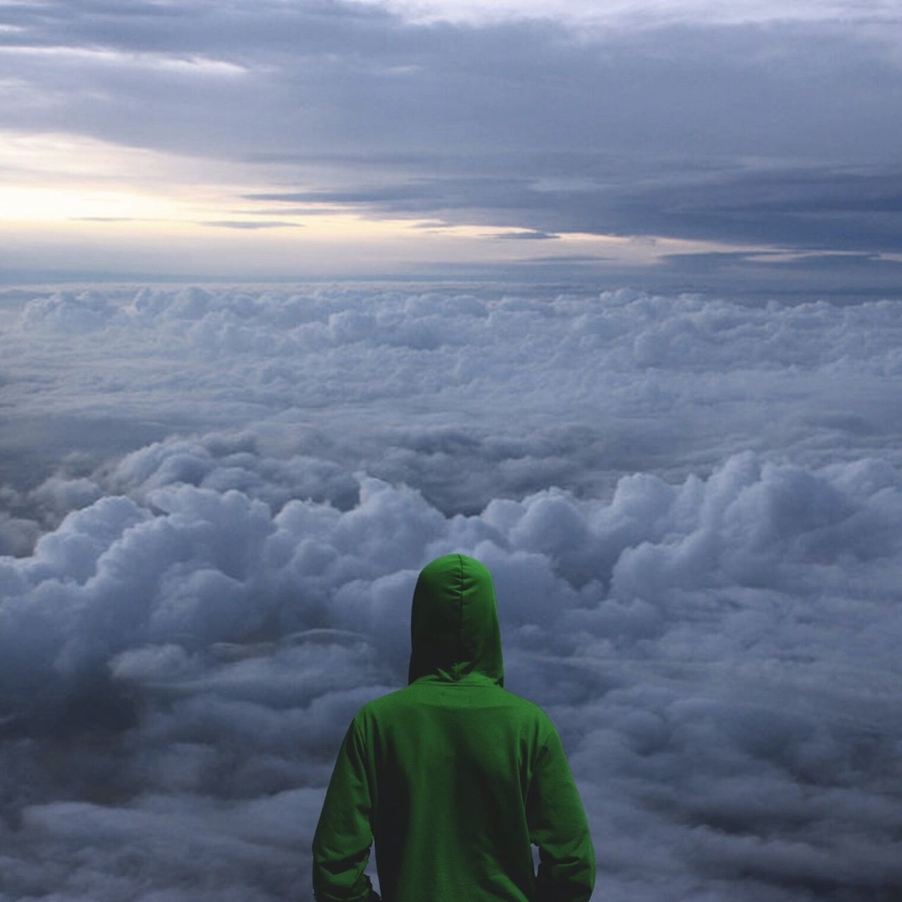 sky, cloud - sky, weather, lifestyles, beauty in nature, standing, scenics, tranquil scene, tranquility, mountain, rear view, nature, men, cloudy, leisure activity, winter, cold temperature, cloud