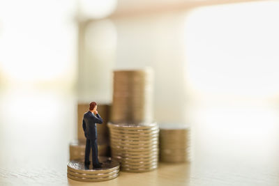 Close-up of coins on table