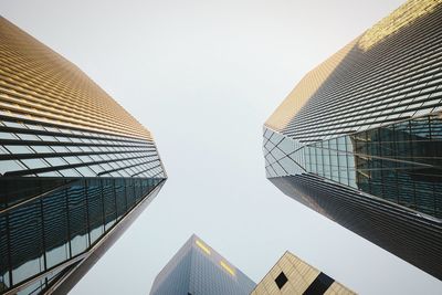 Low angle view of modern building against clear sky