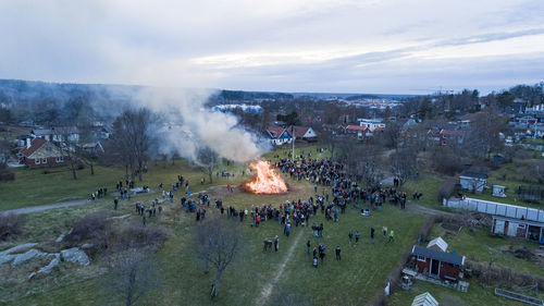 High angle view of people around bonfire