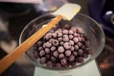 High angle view of coffee beans in container on table