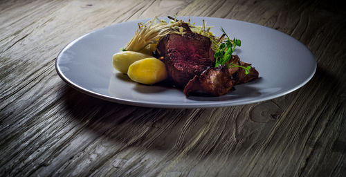 Close-up of meal served on table