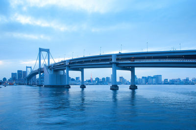 Rainbow bridge and city skyline at odaiba, tokyo, kanto region, honshu, japan