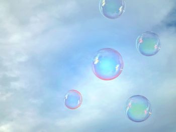 Low angle view of bubbles in water