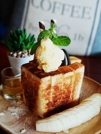 Close-up of cake served on table