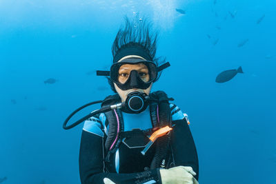 Diver looking at camera at great barrier reef