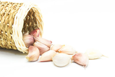 Close-up of chocolate cake on table against white background