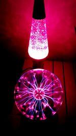 Low angle view of illuminated christmas lights