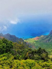 Scenic view of tree mountains against sky