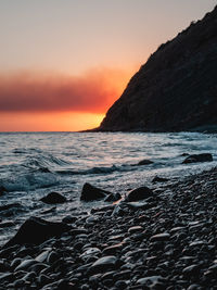 Scenic view of sea against sky during sunset