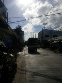 Cars on road against sky