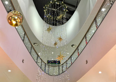 Low angle view of illuminated chandelier