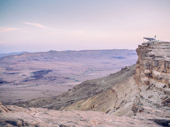 Scenic view of desert at dusk