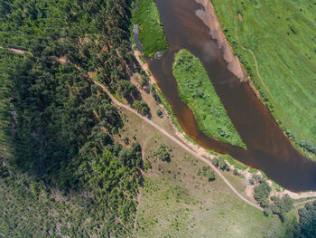 Aerial view of mologa river flowing by landscape