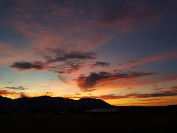 Scenic view of dramatic sky during sunset