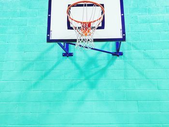 Low angle view of basketball hoop at wall